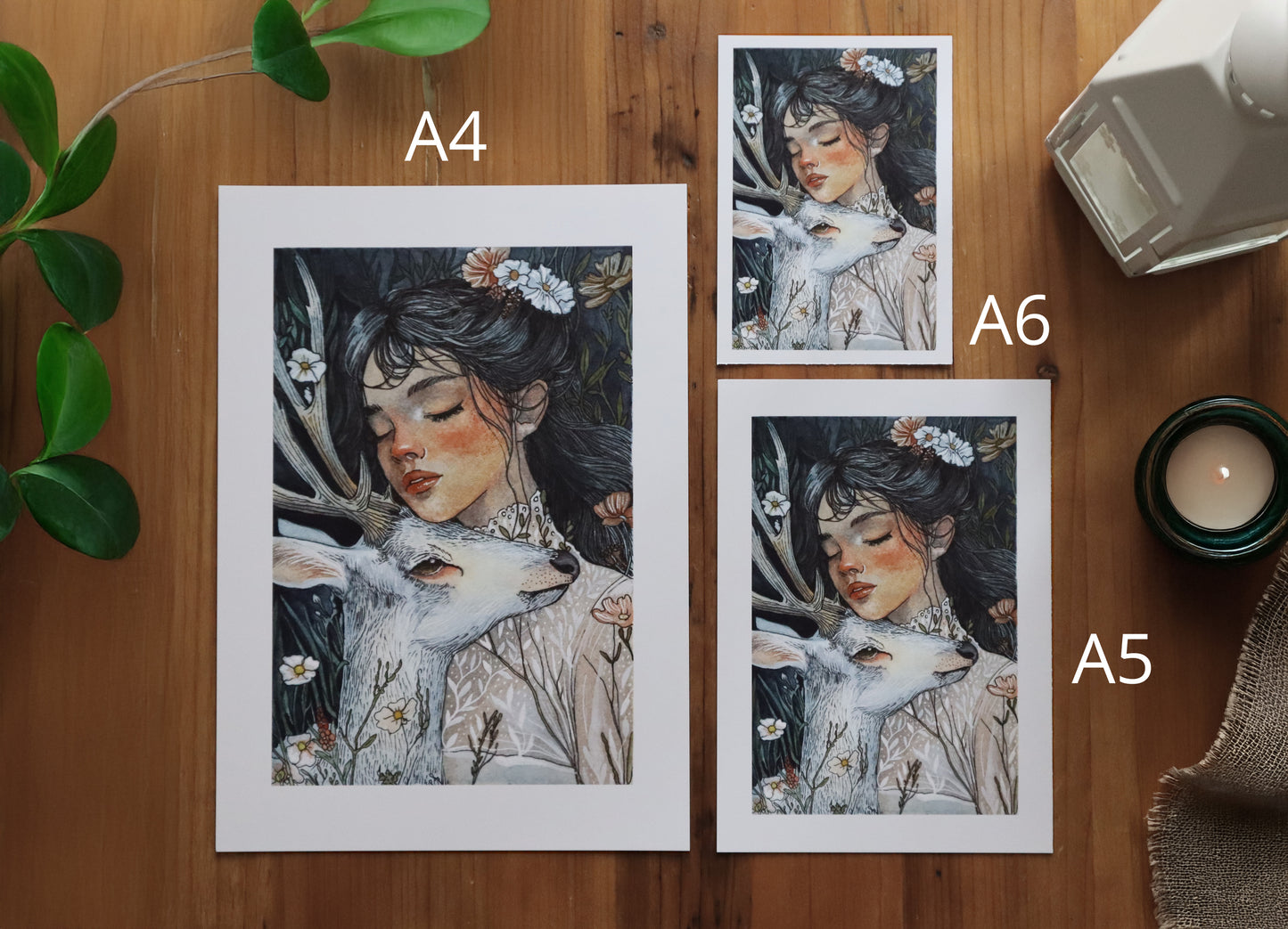 A mystical print featuring a woman and a white stag in a lush botanical setting, inspired by nature’s sacred bond.