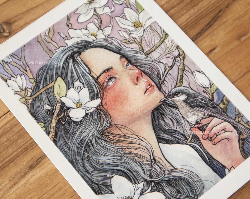 A fine art print of a mystical woman surrounded by blooming magnolias – soft, feminine, and botanical.