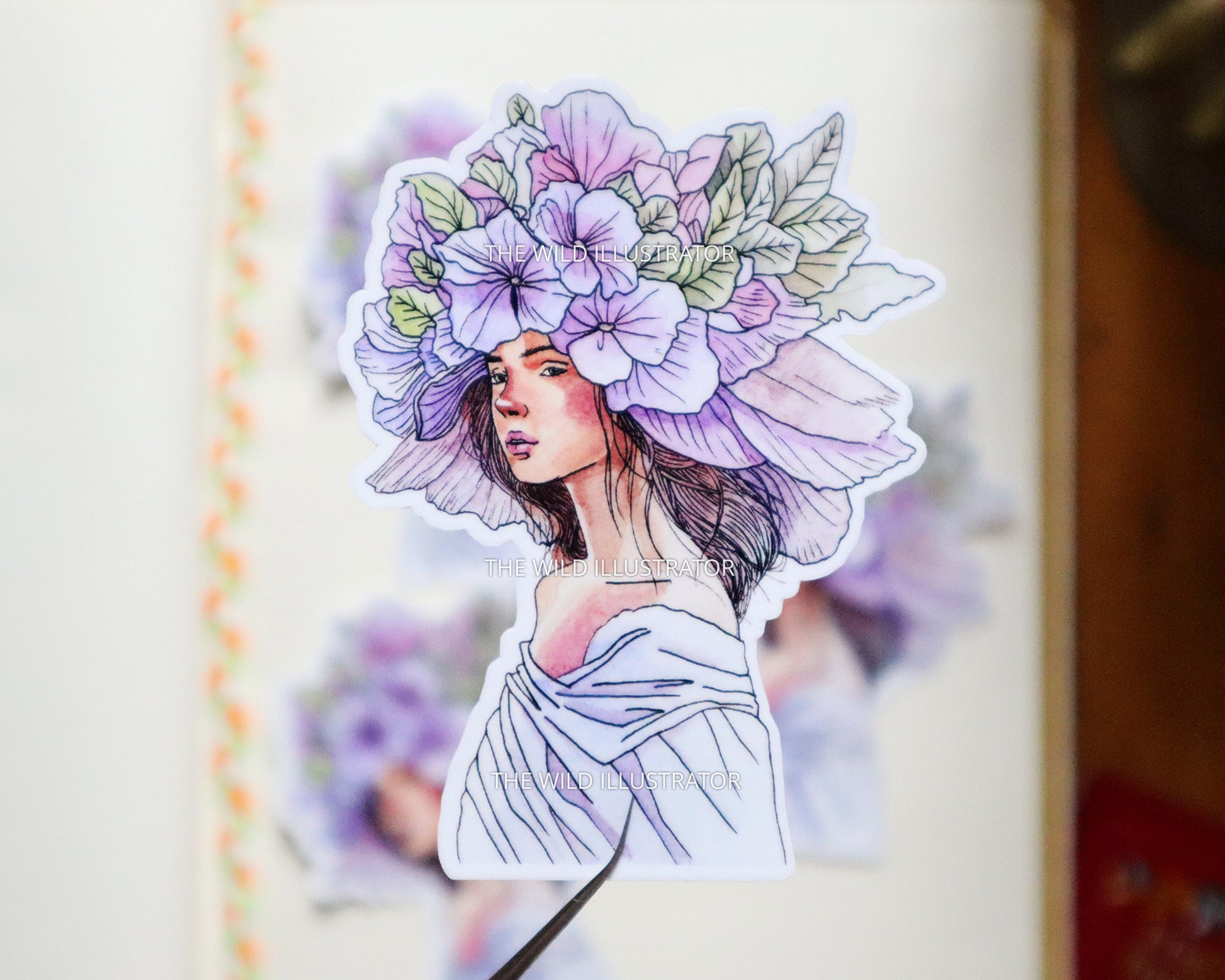 Handmade Floral Reverie sticker featuring a pastel floral design of a woman with flowers in her hair, capturing the serenity of spring.