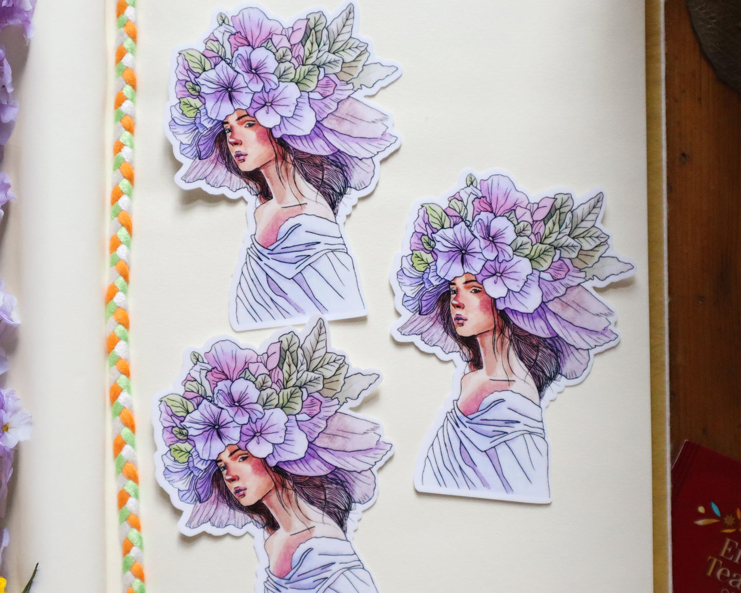 Handmade Floral Reverie sticker featuring a pastel floral design of a woman with flowers in her hair, capturing the serenity of spring.