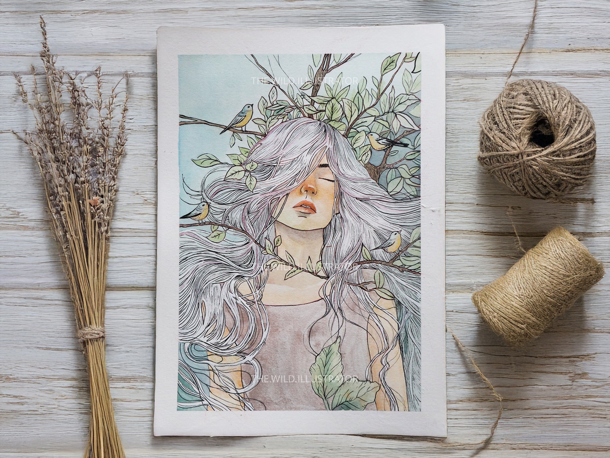 Hand-painted watercolor artwork of a woman surrounded by foliage and birds, with shimmering metallic highlights. Size 19x27 cm on 100% cotton paper.