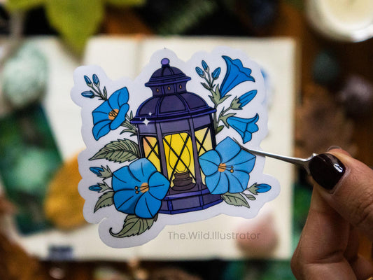 Lantern of the Spirits sticker with mystical lantern art, spiritual symbols, and flowers on glossy vinyl, perfect for journals and laptops.