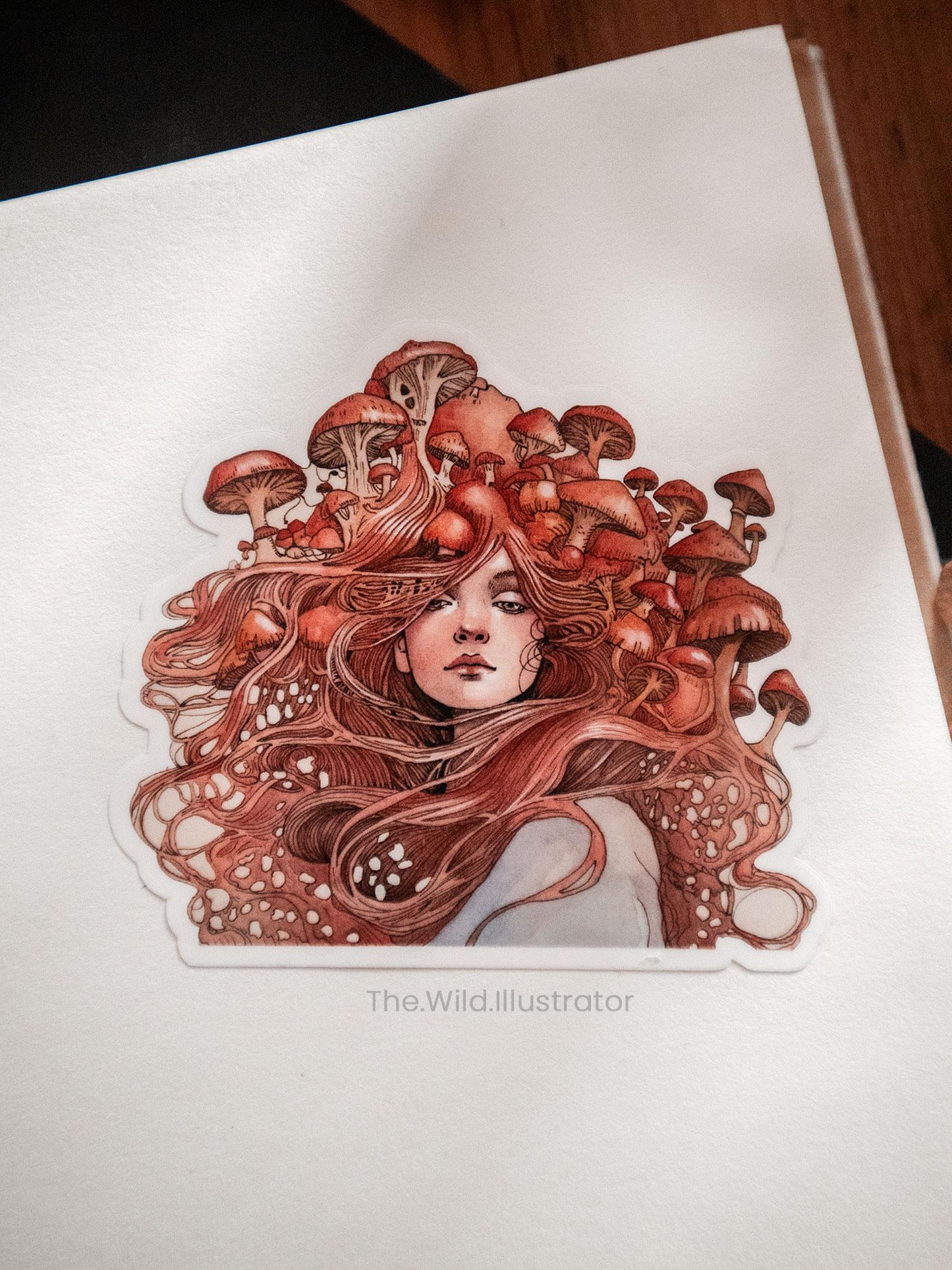 Handmade vinyl sticker featuring a mystical woman surrounded by mushrooms, ideal for journals and water bottles.